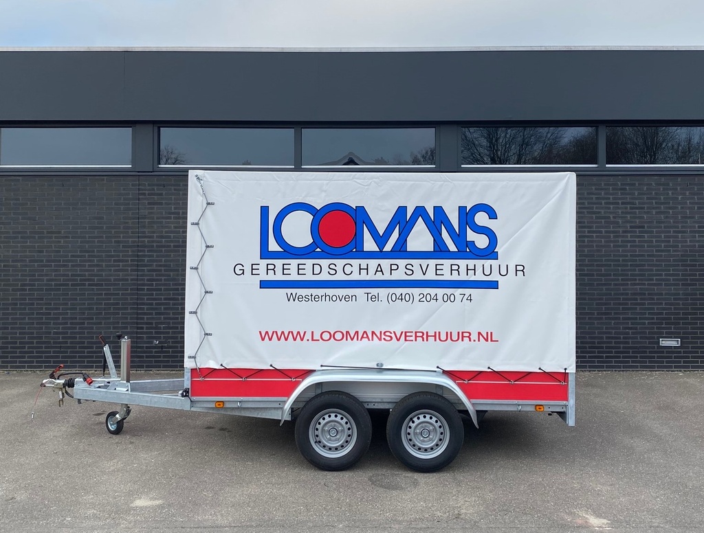 Aanhanger met huif dubbelasser